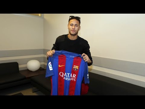 Neymar Jr signs FC Barcelona shirt for Chapecoense