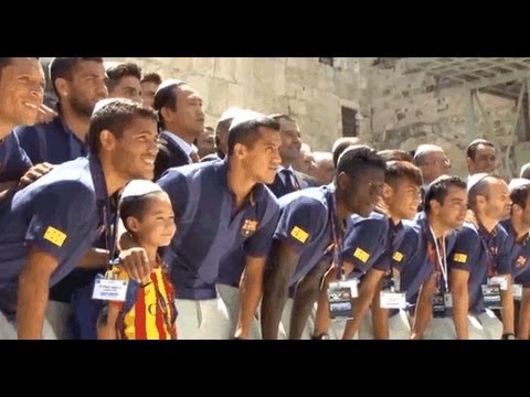 FC Barcelona, led by football star Messi, visits the Holy Land